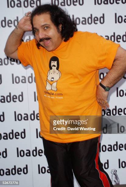 Ron Jeremy and an unidentified guest attend the "Loaded Relaunch Party", relaunching the men's monthly magazine, at Portland Place on April 20, 2005...