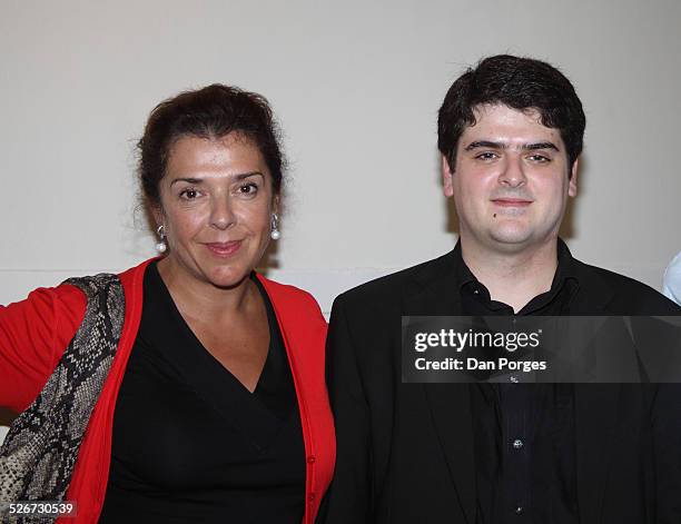 Pianist Elena Bashkirova and violinist Michael Barenboim, Daniel Barenboim and her son pose to the camera after concert in the dressing room under...