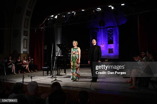 Soprano singer Angela Denoke and pianist Kirill Gerstein bow to the audience in curtain call at the end of performance in concert at the Seventeenth...