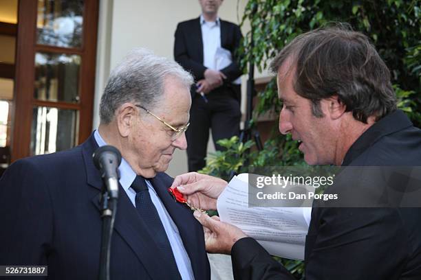 Christof Bigot, French Ambassador to Israel pinning the Knight Medal of the National Order of the Legion of Honour on the chest of Joseph Ciechanover...