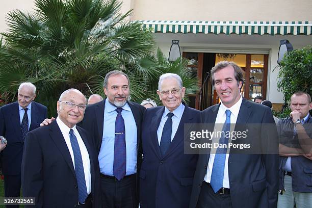 Yaakov Neeman, former Finance Minister, Avigdor Lieberman, Foreign Minister Joseph Ciechanover an Israeli diplomat and businessman, about to receive...