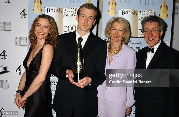 Actress Amanda Donohoe, writer David Mitchell, Sandra Howard, wife of Tory leader Michael Howard, and actor Griff Rhys Jones pose in the Awards Room...