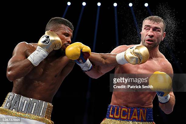 Lucian Bute of Canada is punched by Badou Jack of Sweden in their WBC super middleweight championship bout at the DC Armory on April 30, 2016 in...