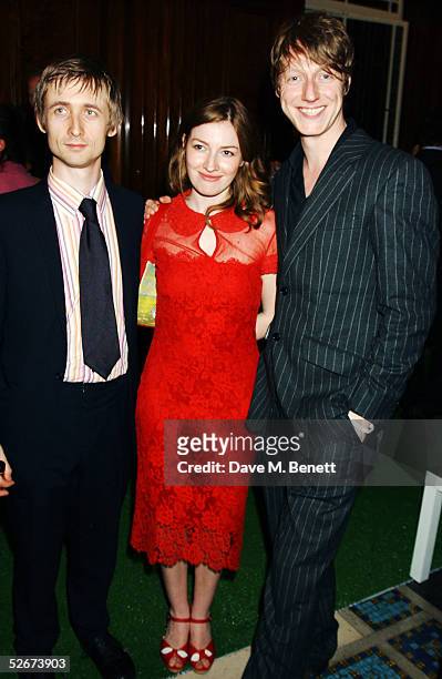 Singer Neil Hannon of The Divine Comedy with actress Kelly McDonald and husband Dougie Payne from Travis attends the aftershow party following the...