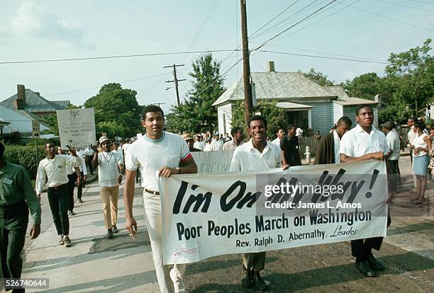 People march for the Poor People's Campaign, a civil rights group lead by Ralph Abernathy. Atlanta, 1968.