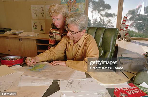 Dr. Seuss Drawing at His Desk