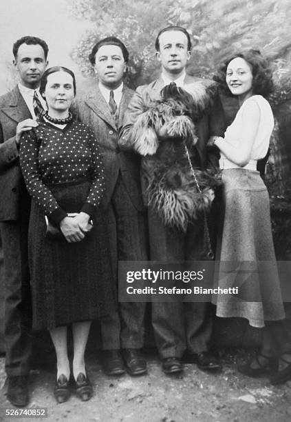 Poets Louis Aragon, Andre Breton, and Paul Eluard with Elsa Triolet Aragon and Nusch Eluard. | Located in: Bibliotheque d'Art et d'Archeologie,...