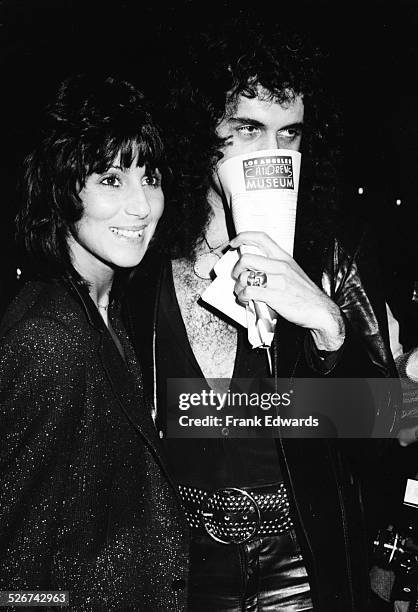 Singer Cher and musician Gene Simmons attending the premiere of the movie 'Kramer vs Kramer', December 1979.