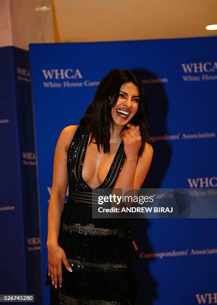 Actress Priyanka Chopra arrives for the 102nd White House Correspondents' Association Dinner in Washington, DC, on April 30, 2016. / AFP / Andrew...