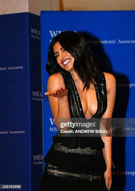 Actress Priyanka Chopra arrives for the 102nd White House Correspondents' Association Dinner in Washington, DC, on April 30, 2016. / AFP / Andrew...