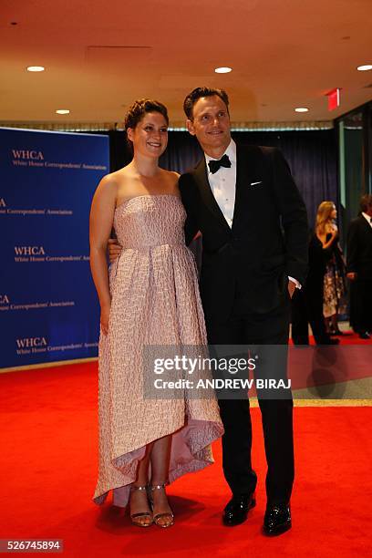 Actor Tony Goldwyn and guest arrive for the 102nd White House Correspondents' Association Dinner in Washington, DC, on April 30, 2016. / AFP / Andrew...