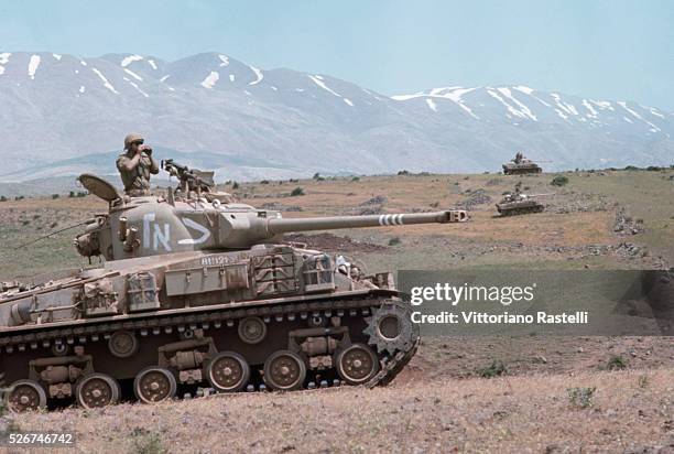 Israeli tanks advance into Syria during the Six-Day War. By June 10, when the fighting was halted, Israel controlled the entire Sinai Peninsula and...