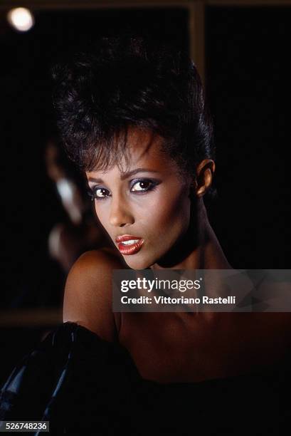 Fashion model Iman poses for photographs.