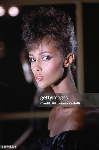 Fashion model Iman poses for photographs.