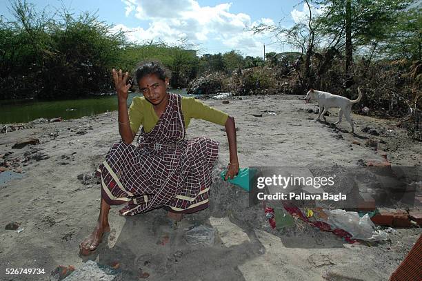 Manian Kaliamma sits on the groundwork of her home which was totally washed away by the tsunami in the MGR Nagar in Nagapatinam. The United Nations...