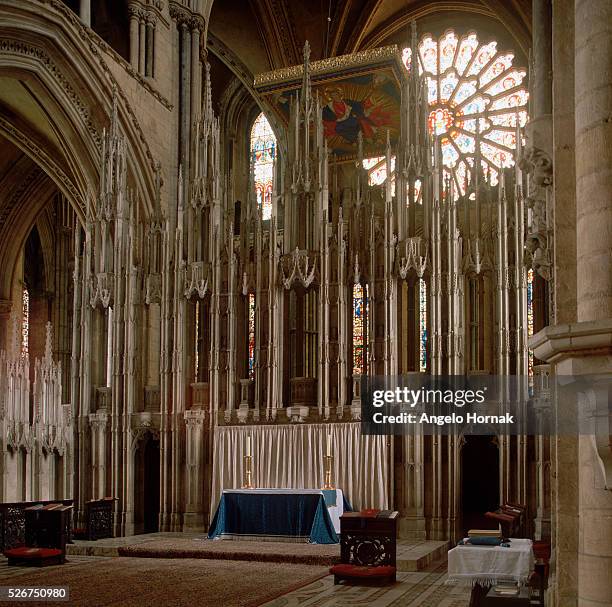 The Neville Screen, which was made from caen stone around 1380, separates the altar from Saint Cuthbert's tomb, in Durham Cathedral.