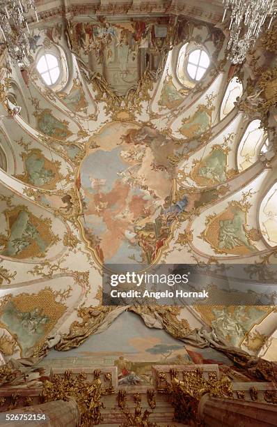 The residence at Wurzburg. The grand staircase built by Balthasar Neumann and ceiling by Giovanni Batista Tiepolo. | Location: The Residence at...