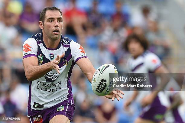 Cameron Smith of the Storm passes the ball during the round nine NRL match between the Gold Coast Titans and the Melbourne Storm on May 1, 2016 in...