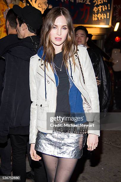 Model Laura Love attends the Vogue.com Met Gala cocktail party at Search & Destroy on April 30, 2016 in New York City.