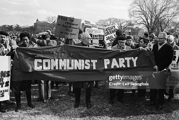 The Communist Party holds a banner at the anti-Vietnam War demonstration in Washington DC.