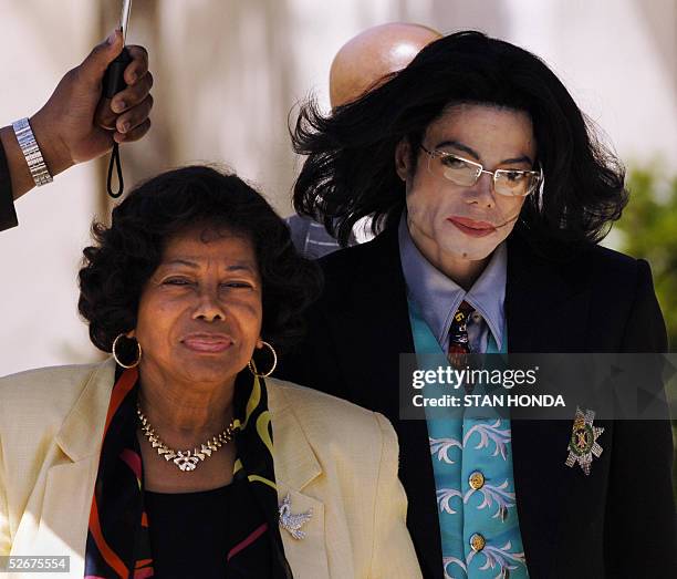 Michael Jackson and his mother Katherine Jackson depart 21 April, 2005 from Santa Barbara County Court in Santa Maria, California, after another day...