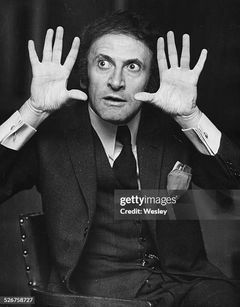 Portrait of French mime artist Marcel Marceau gesticulating with his hands, at a press conference, Saville Theatre, London, October 30th 1967.