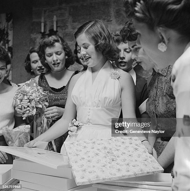 Bride Opening Gifts at a Bridal Shower