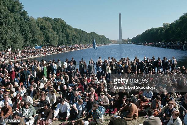 Protesters at an anti-Vietnam War rally crowd around the reflecting pool at the Washington Monument in Washington, DC, October 21, 1967.