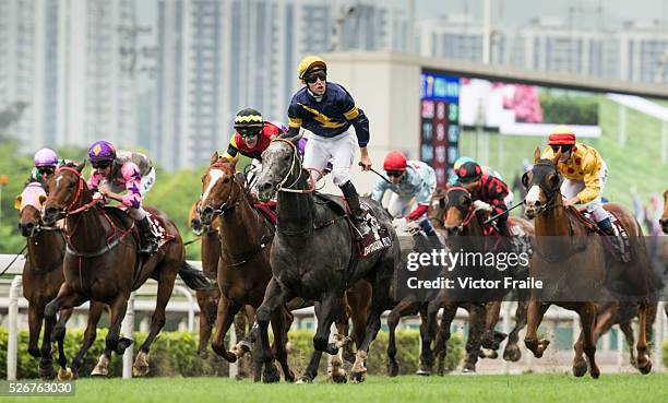 Tommy Berry riding Chautauqua celebrates after winning The Chairman's Sprint Prize race at Sha Tin Racecourse on May 1, 2016 in, Hong Ko