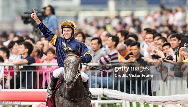 Tommy Berry riding Chautauqua celebrates after winning The Chairman's Sprint Prize race at Sha Tin Racecourse on May 1, 2016 in, Hong Ko