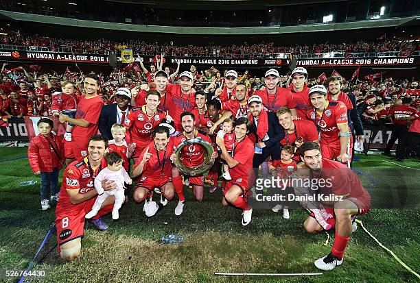 United players pose for a photo in front of their supporters after the 2015/16 A-League Grand Final match between Adelaide United and the Western...