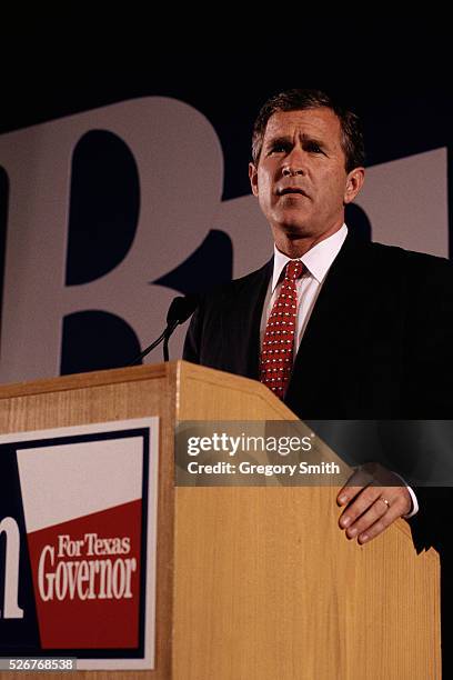 Gubernatorial candidate George W. Bush speaks at a podium during a fundraiser in his bid for the governor of Texas. Bush was elected to the first of...