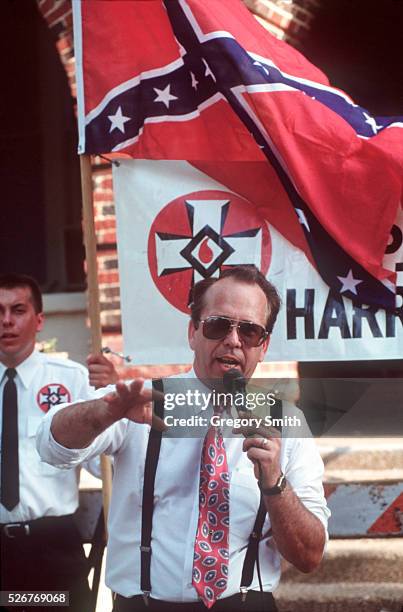 Thom Robb, the Grand Dragon of the Klu Klux Klan, talks at a Klan rally outside the courthouse. --- Photo by Greg Smith/Corbis SABA