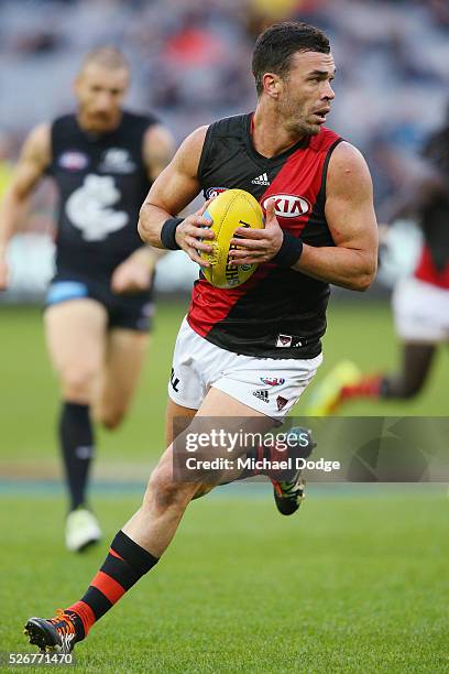 Ryan Crowley of the Bombers looks upfield during the round six AFL match between the Carlton Blues and the Essendon Bombers at Melbourne Cricket...