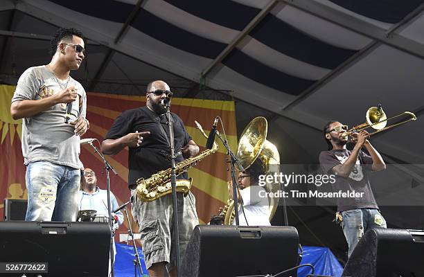 Members of The Soul Rebels brass band performs during the 2016 New Orleans Jazz & Heritage Festival at Fair Grounds Race Course on April 30, 2016 in...