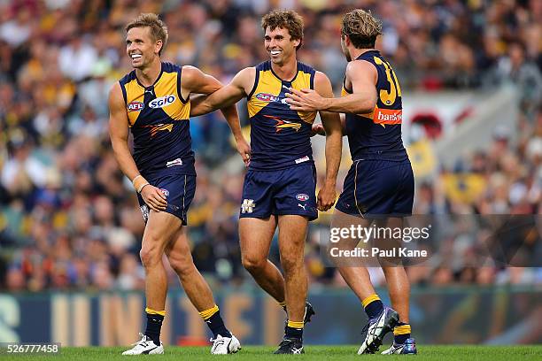 Jamie Cripps of the Eagles celebrates a goal with Mark LeCras and Mark Hutchings during the round six AFL match between the West Coast Eagles and the...