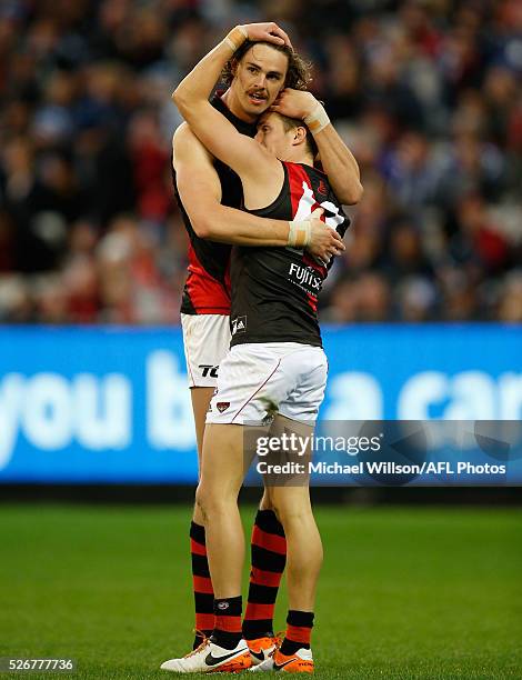 Joe Daniher and Orazio Fantasia of the Bombers celebrate during the 2016 AFL Round 06 match between the Carlton Blues and the Essendon Bombers at the...