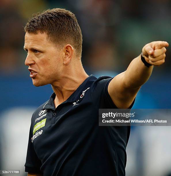 Brendon Bolton, Senior Coach of the Blues addresses his players during the 2016 AFL Round 06 match between the Carlton Blues and the Essendon Bombers...