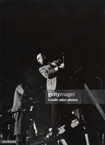 The French film director, Marcel Carn�� on the shooting of his film "Les Portes de la nuit" in 1947.