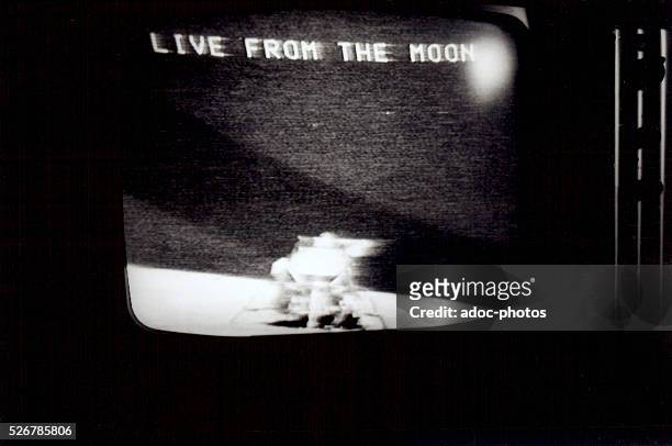 The mission Apollo 16 broadcast live on a TV screen . In 1972.