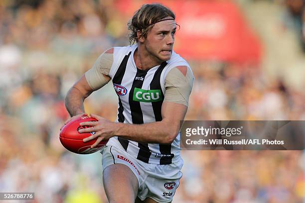 Ben Sinclair of the Magpies runs with the ball during the round six AFL match between the West Coast Eagles and the Collingwood Magpies at Domain...