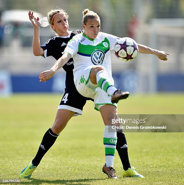 Kathrin Hendrich of 1. FFC Frankfurt challenges Isabel Kerschowski of VfL Wolfsburg during the UEFA Women's Champions League Semi Final second leg...