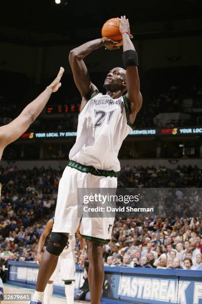 Kevin Garnett of the Minnesota Timberwolves shoots against the Utah Jazz during the game at Target Center on April 6, 2005 in Minneapolis, Minnesota....