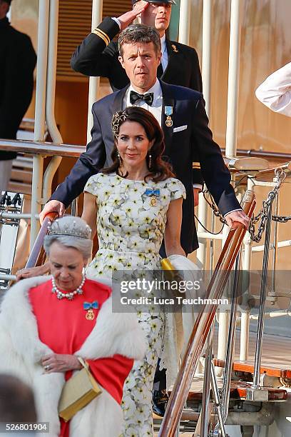 Crown Princess Mary Of Denmark and Crown Prince Frederik of Denmark are seen leaving the yacht " Dannebrogen " for the 70th birthday of King Carl...