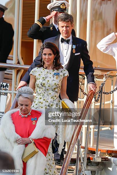 Crown Princess Mary Of Denmark and Crown Prince Frederik of Denmark are seen leaving the yacht " Dannebrogen " for the 70th birthday of King Carl...