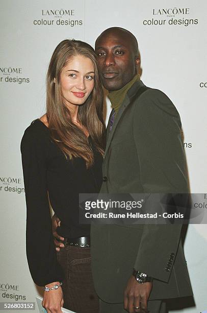 Designer Oswald Boateng and his wife attend the 2001 Lancome Colour Design Awards in London.