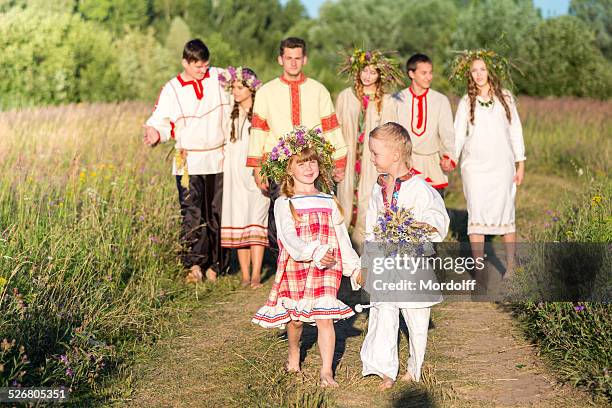 russian people are going on celebrate ivan kupala day - folk stock pictures, royalty-free photos & images