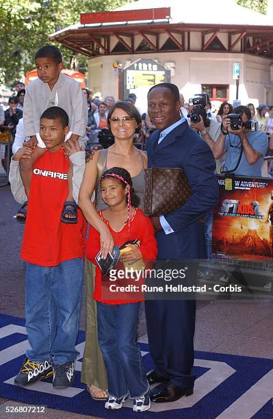 Boxer Chris Eubank and his family arrive at the premiere of "Spy Kids 2: Island of Lost Dreams" at the Odeon West End.