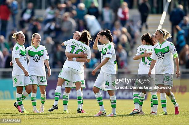 VfL Wolfsburg players celebrate victory in the UEFA Women's Champions League Semi Final second leg match between 1. FFC Frankfurt and VfL Wolfsburg...