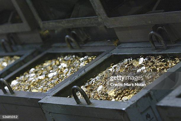 New money awaits counting and bagging at the Royal Australian Mint April 22, 2005 in Canberra, Australia. The Royal Australian Mint celebrated its...